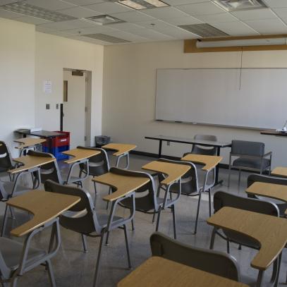 Classroom with individual seating and whiteboard