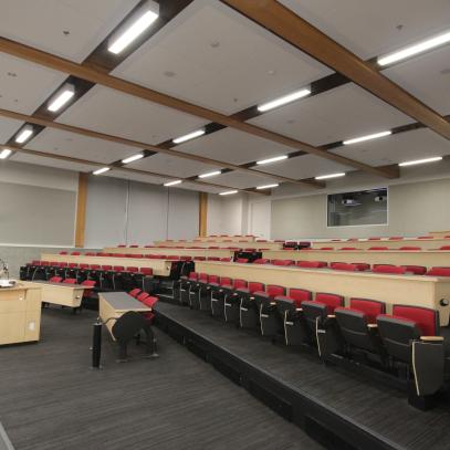 Front of room, lectern and auditorium seating 