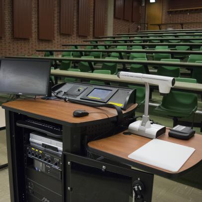 View of lectern with auditorium seating in background