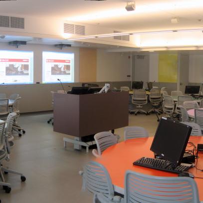 Panoramic of dual projection room with group tables