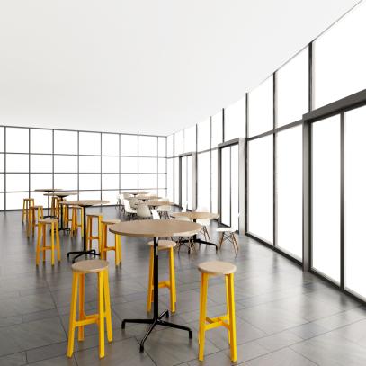 Room with windows, tables and stools