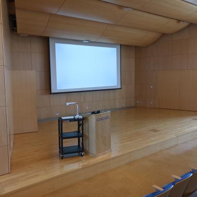 Stage with presentation in auditorium