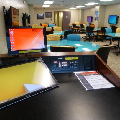 Lectern top with view of active learning classroom in background